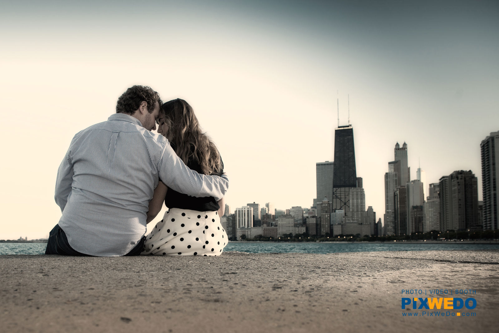 Fullerton Beach engagement photosession with chicago skyline